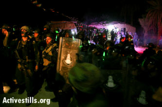 Israeli army and police raid and evict the Ein Hijleh protest camp in the early morning hours of February 7, 2014.